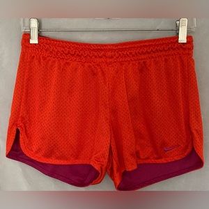 Nike Dri-Fit shorts woman's track size (XS)orange Dri-Fit track
